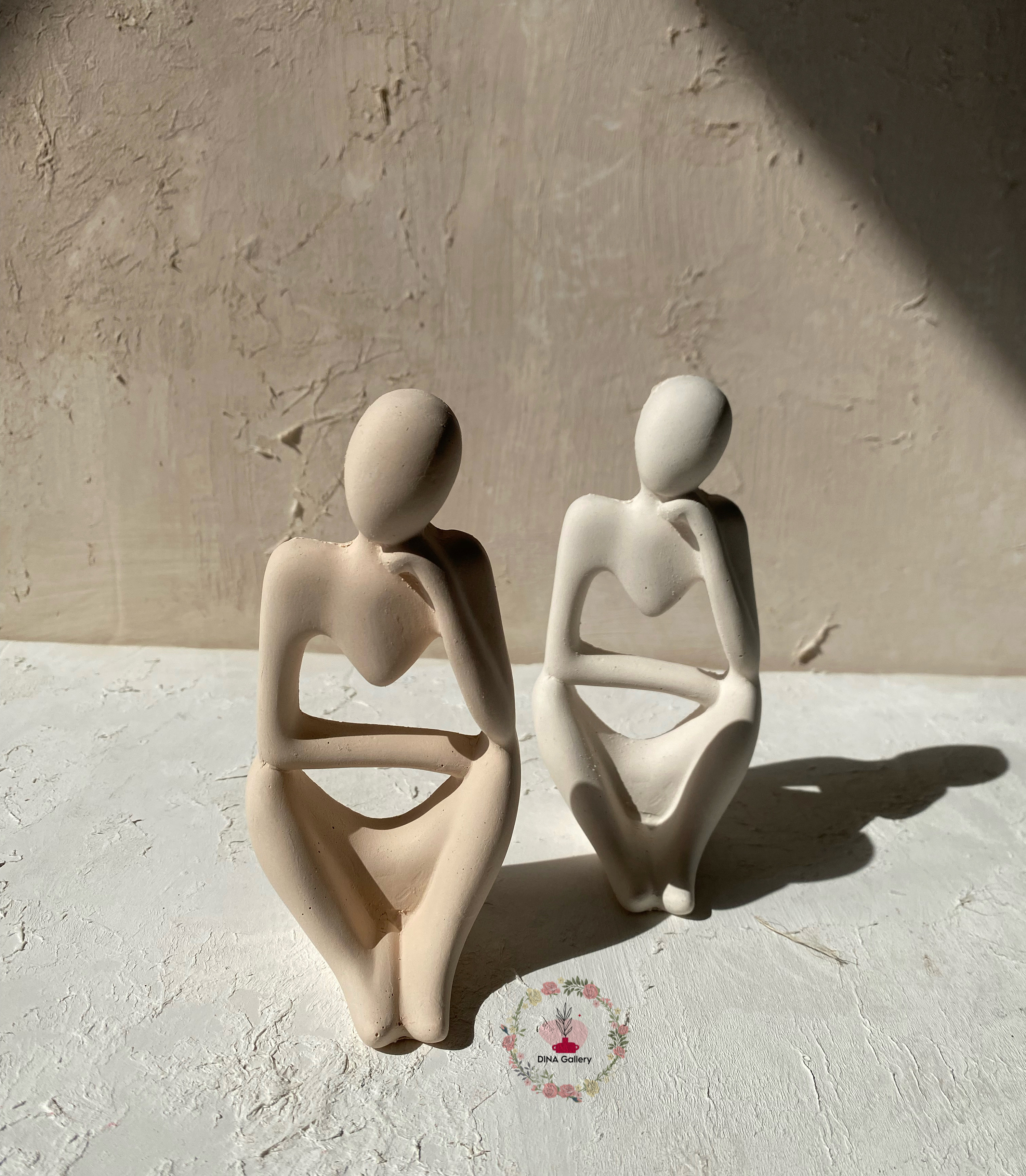 مجسمه بتنی آدمک متفکر